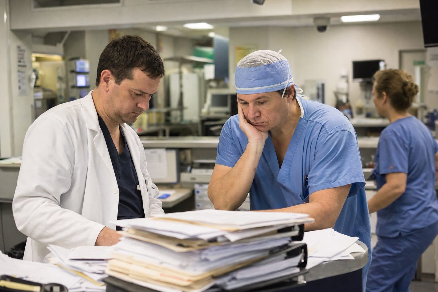 A physician and surgeon buried in prior-authorization paperwork